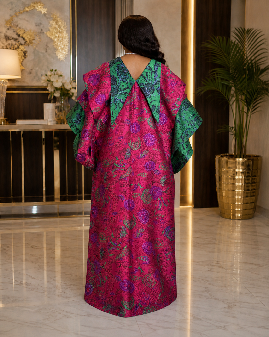 A regal magenta and emerald luxury African boubou featuring bold print detailing, statement layered sleeves, and a flowing maxi silhouette. Perfect for weddings, birthdays, owambe parties, church, Eid, and elegant cultural celebrations.